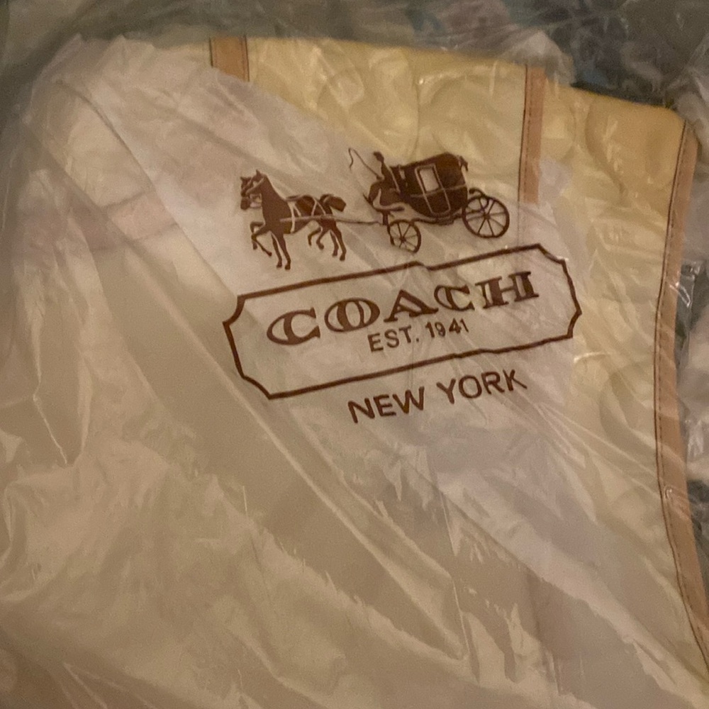 Brand new still in original pack Coach embossed Peyton bag with adjustable strap